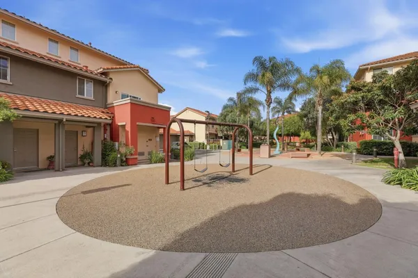 a street with a building in the background