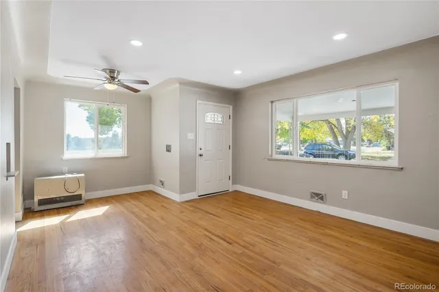 a view of an empty room with a window