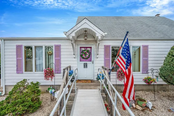 a front view of house with outdoor space