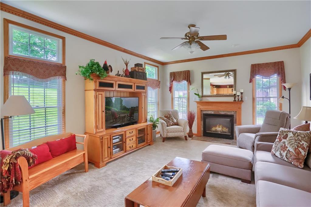 4014 Dickey Road Gibsonia, PA 15044 - Photo 18 of 50 a living room with furniture and a flat screen tv