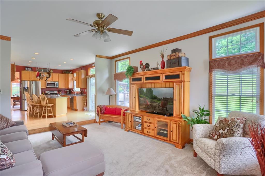 4014 Dickey Road Gibsonia, PA 15044 - Photo 19 of 50 a living room with furniture and a flat screen tv