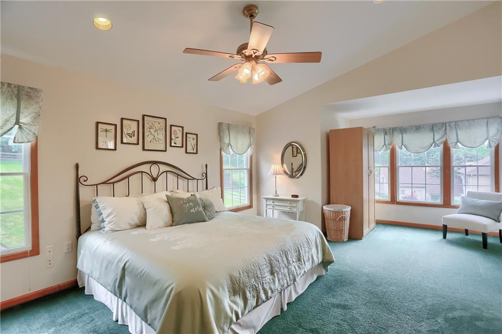 4014 Dickey Road Gibsonia, PA 15044 - Photo 22 of 50 a bedroom with a large bed and a window