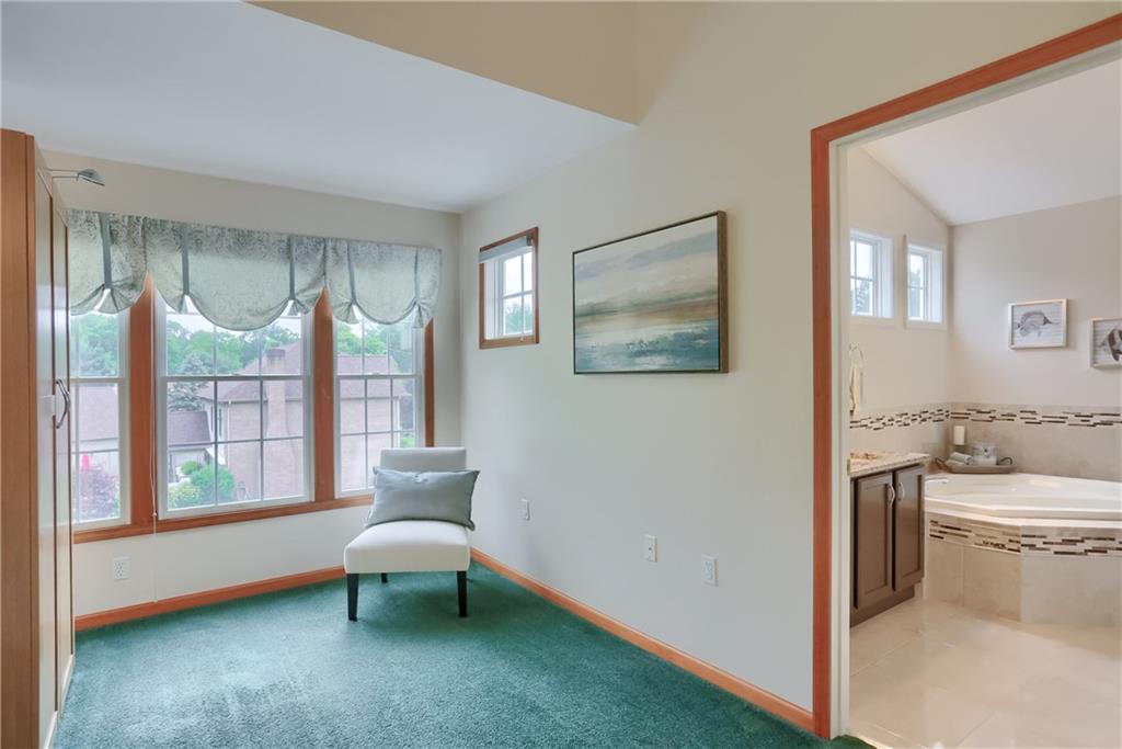 4014 Dickey Road Gibsonia, PA 15044 - Photo 24 of 50 a view of a room that has a couch and a table in it