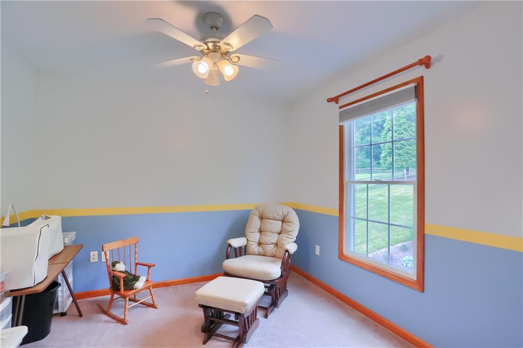 4014 Dickey Road Gibsonia, PA 15044 - Photo 30 of 50 a living room with furniture and a window