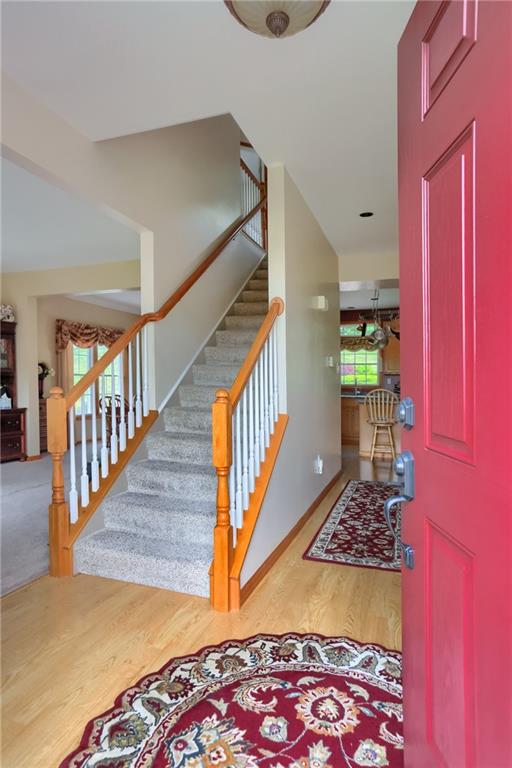 4014 Dickey Road Gibsonia, PA 15044 - Photo 3 of 50 a walk in closet with wooden floor