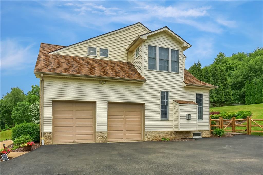 4014 Dickey Road Gibsonia, PA 15044 - Photo 36 of 50 a front view of a house with a yard