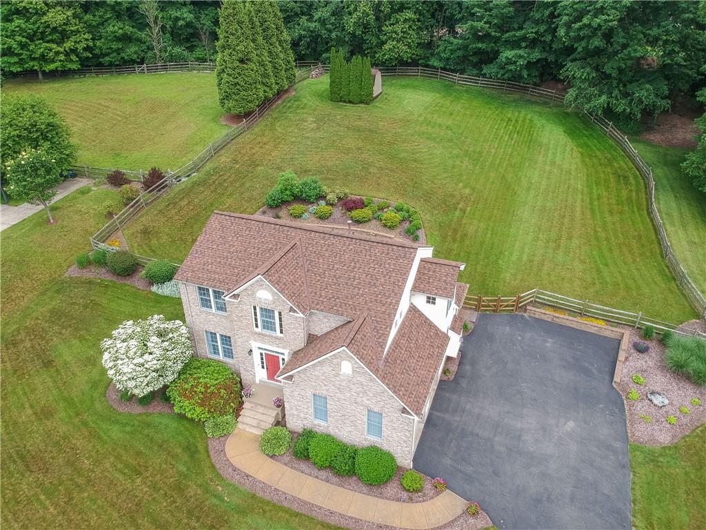 4014 Dickey Road Gibsonia, PA 15044 - Photo 37 of 50 an aerial view of a house with a garden and lake view