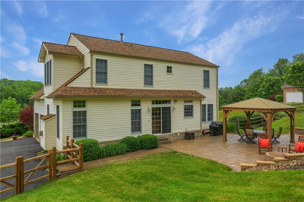 4014 Dickey Road Gibsonia, PA 15044 - Photo 40 of 50 a view of a house with a yard and sitting area