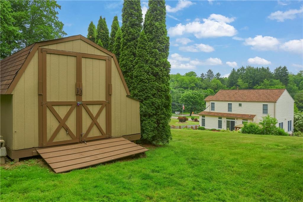 4014 Dickey Road Gibsonia, PA 15044 - Photo 42 of 50 a front view of a house with garden