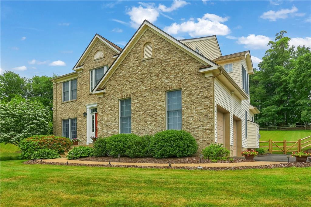 4014 Dickey Road Gibsonia, PA 15044 - Photo 50 of 50 a front view of a house with a yard