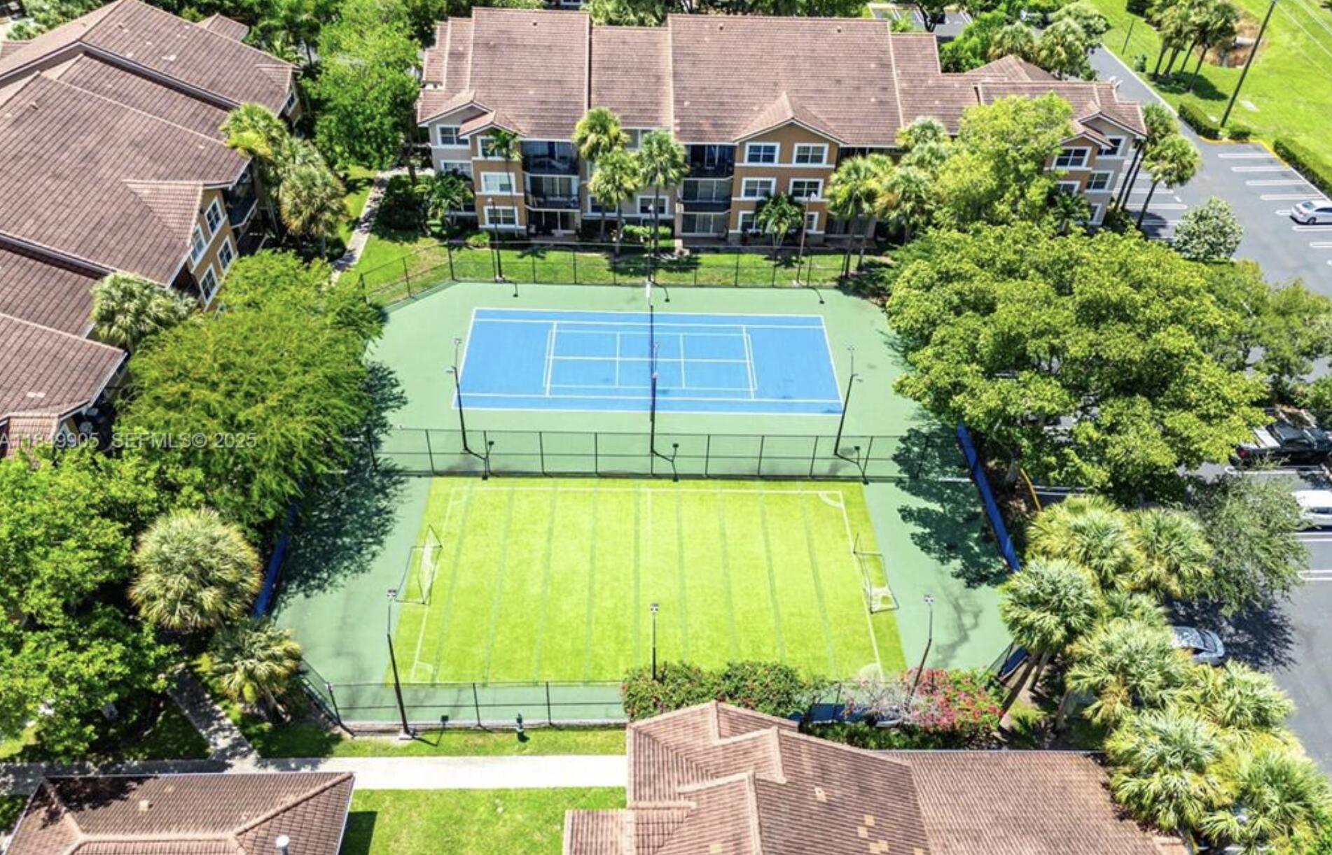 8955 Wiles Road, Unit 306 Coral Springs, FL 33067 - Photo 4 of 12 Tennis Court