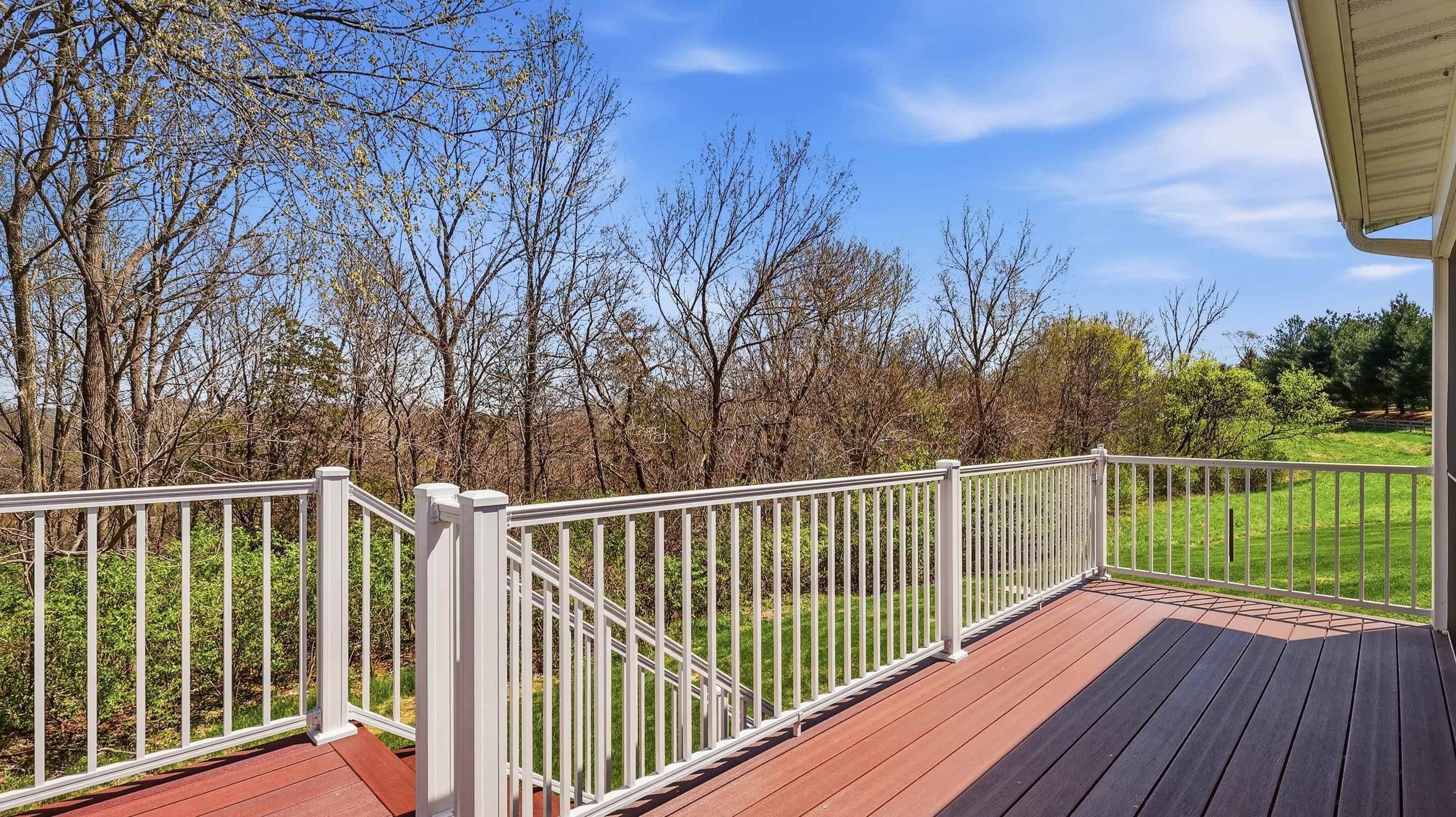 1967 East Cross Road Galena, IL 61036 - Photo 19 of 51 a view of balcony with wooden floor and fence