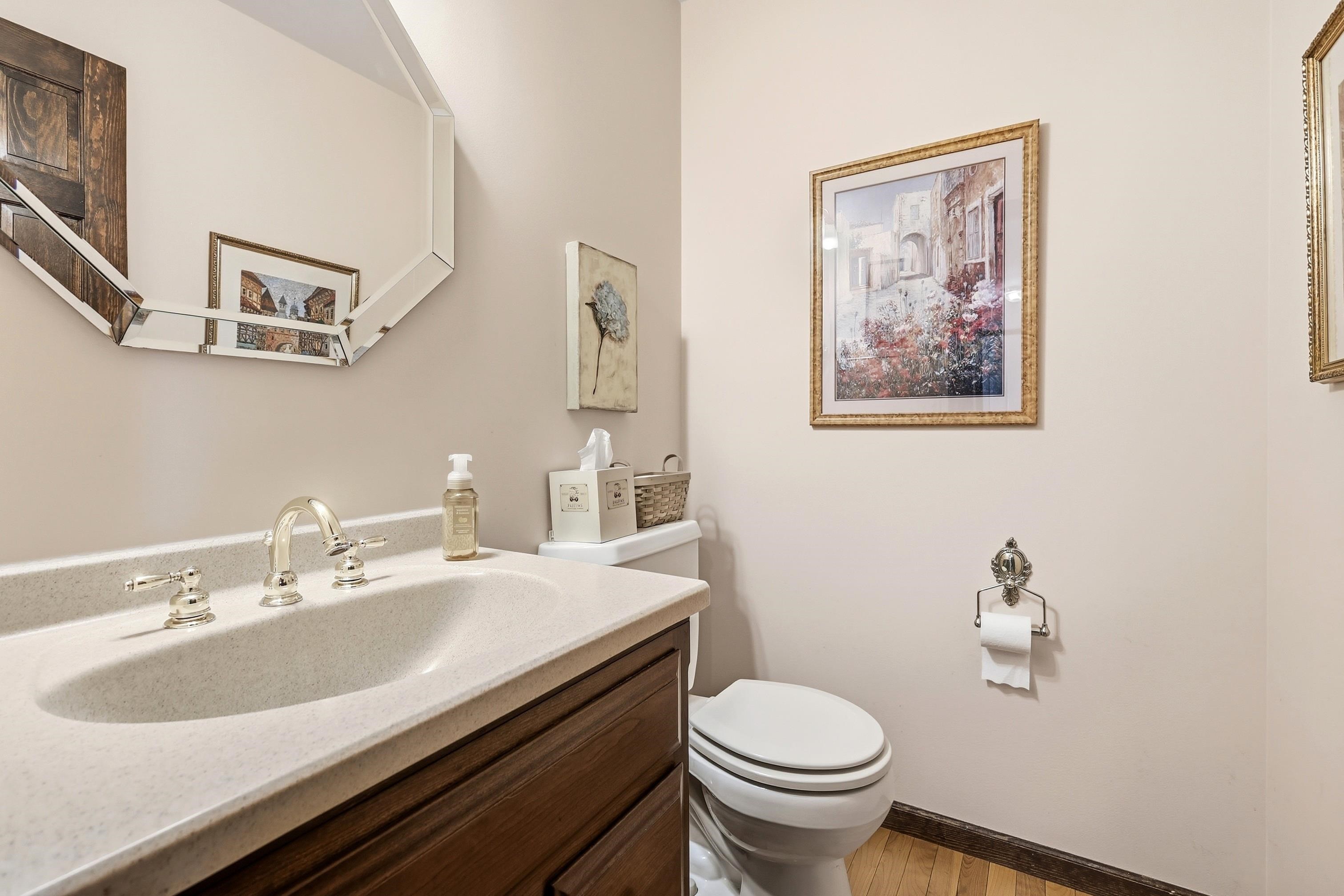1967 East Cross Road Galena, IL 61036 - Photo 23 of 51 a bathroom with a sink and a toilet