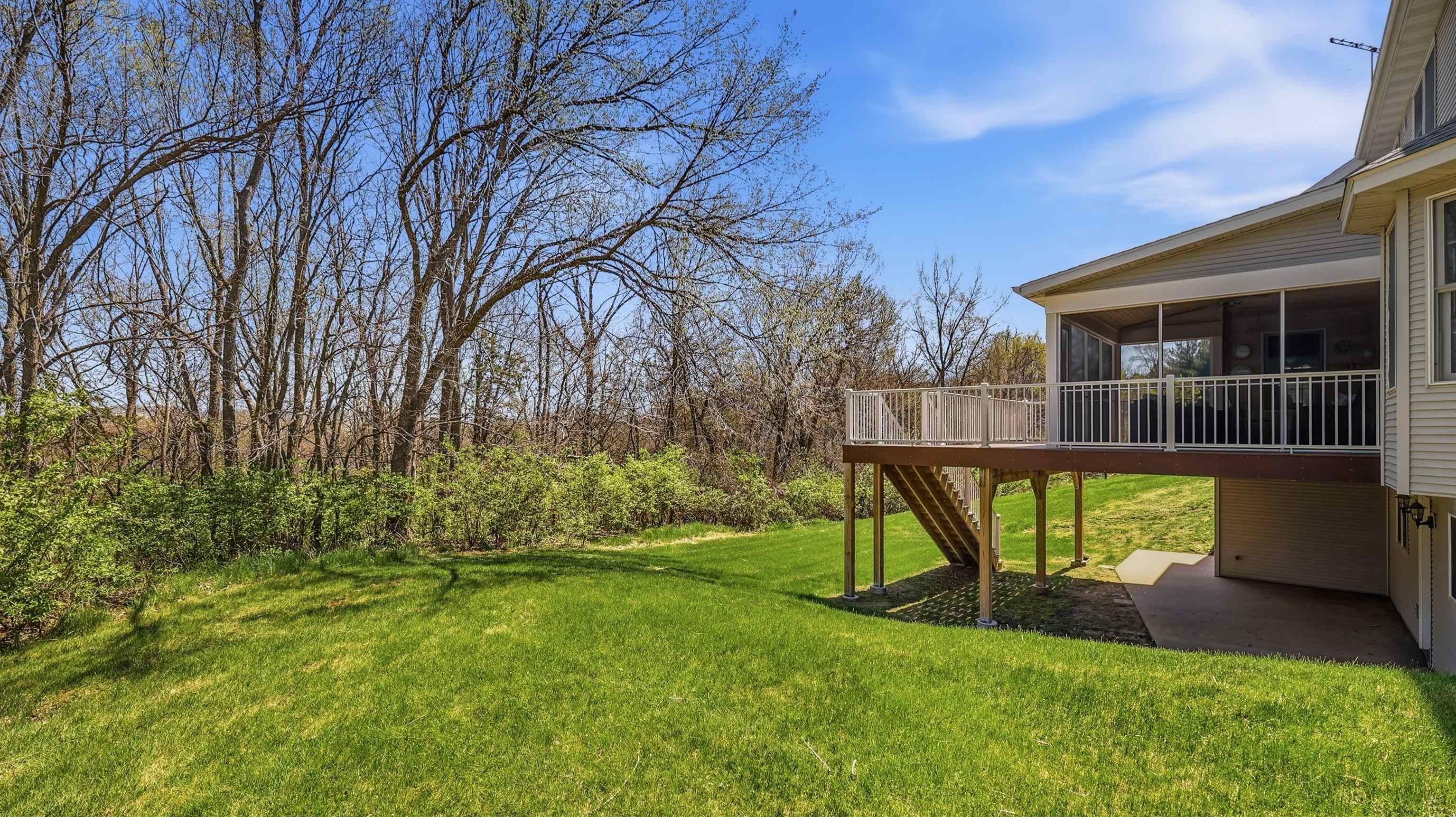 1967 East Cross Road Galena, IL 61036 - Photo 47 of 51 a view of backyard with a table and chairs