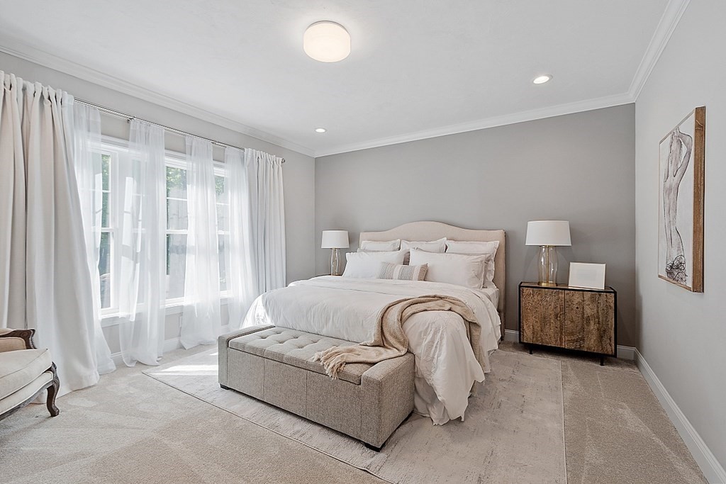 30 Wheeler Hill Road, Unit 61 Berlin, MA 01503 - Photo 14 of 31 a spacious bedroom with a bed and window