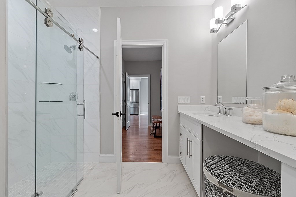 30 Wheeler Hill Road, Unit 61 Berlin, MA 01503 - Photo 16 of 31 a bathroom with a double vanity sink and a mirror