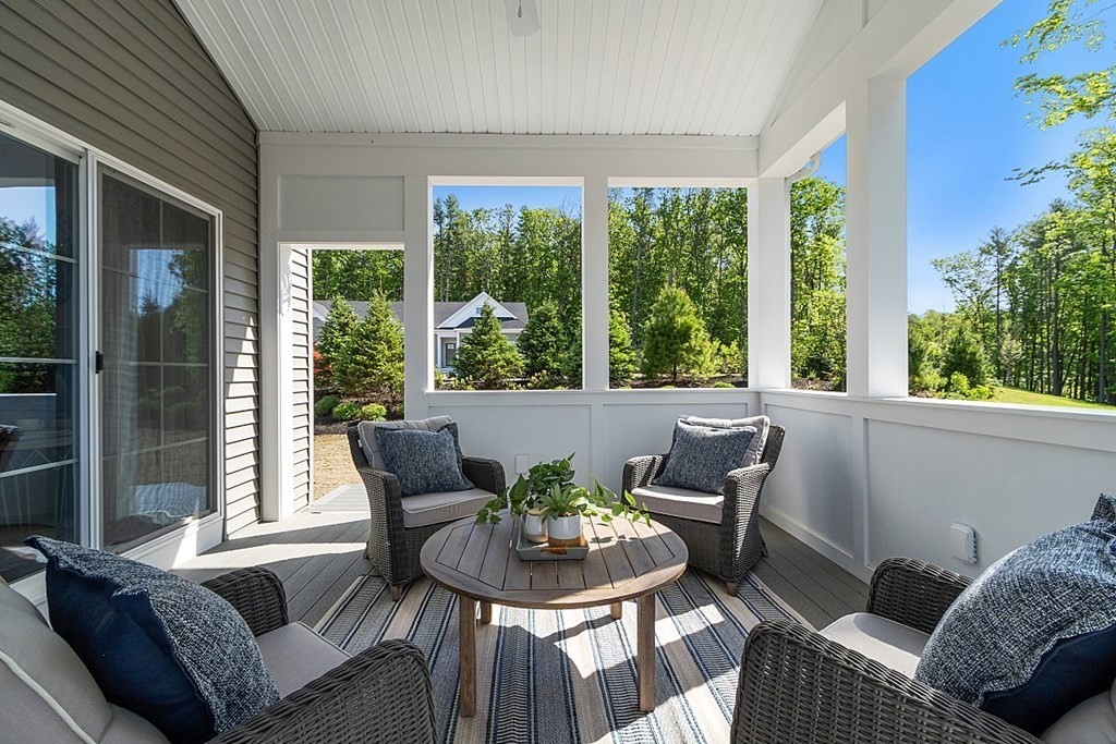 30 Wheeler Hill Road, Unit 61 Berlin, MA 01503 - Photo 24 of 31 a view of a dining room with furniture window and outside view
