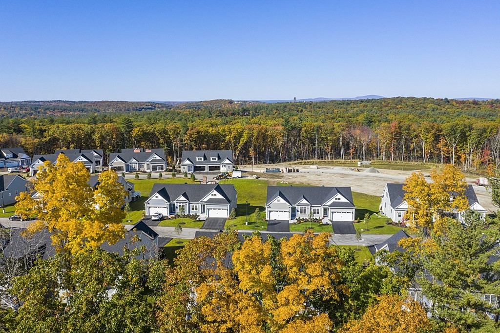 30 Wheeler Hill Road, Unit 61 Berlin, MA 01503 - Photo 29 of 31 an aerial view of residential houses with outdoor space
