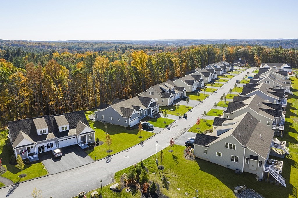 30 Wheeler Hill Road, Unit 61 Berlin, MA 01503 - Photo 31 of 31 an aerial view of a house with a swimming pool