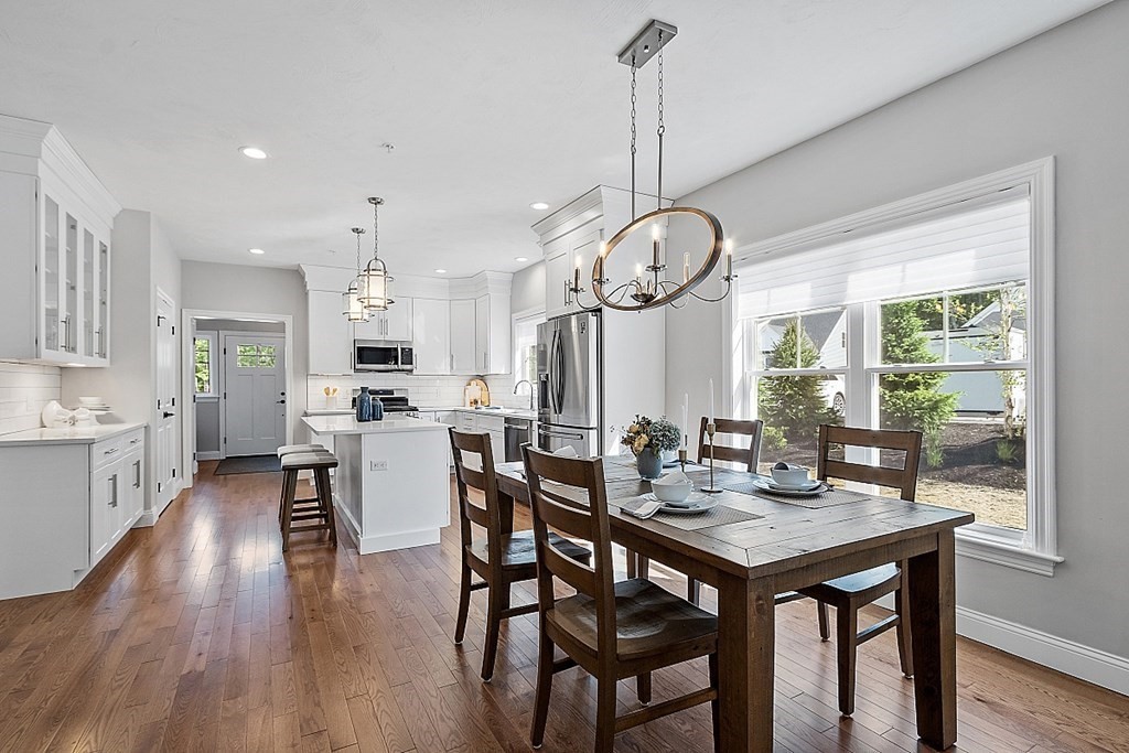 30 Wheeler Hill Road, Unit 61 Berlin, MA 01503 - Photo 7 of 31 a view of a dining room and livingroom view