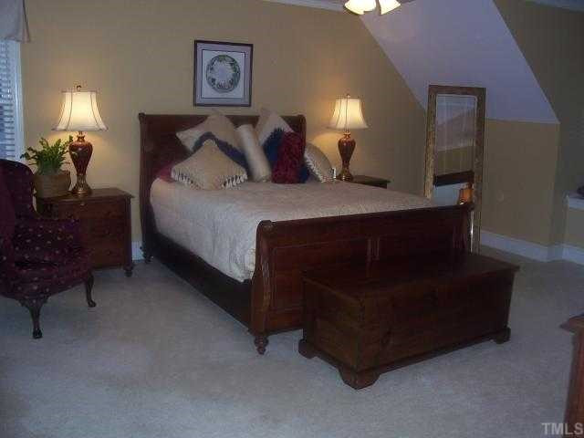 7909 Sutterton Court Raleigh, NC 27615 - Photo 7 of 12 Spacious, Cozy and Comfy Master Retreat -- quaint Window Seat. Super Walk-in Closet. Master Bedroom