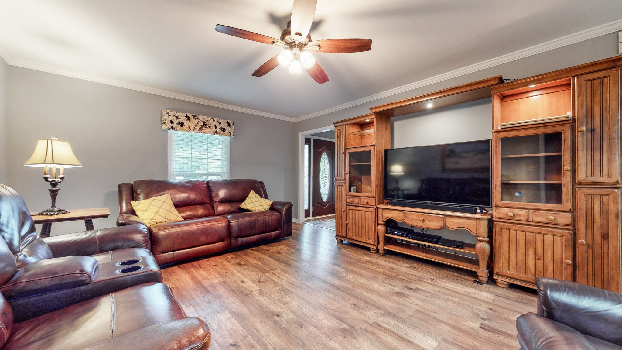 2019 Hidden Cove Road Mount Juliet, TN 37122 - Photo 11 of 29 a living room with furniture flat screen tv and wooden floor