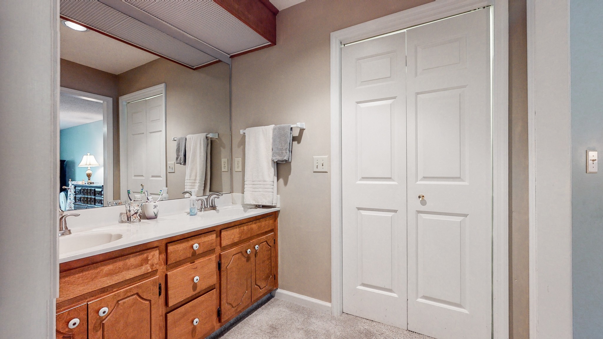 2019 Hidden Cove Road Mount Juliet, TN 37122 - Photo 15 of 29 a bathroom with a double vanity sink and a mirror