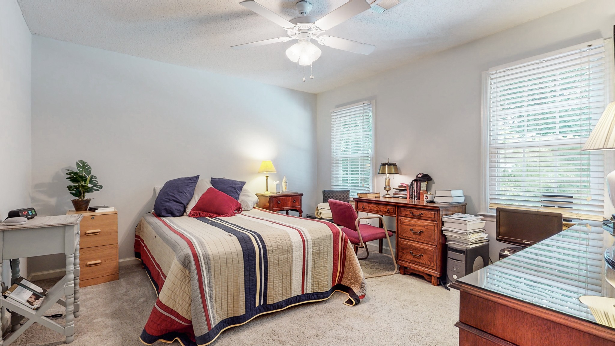 2019 Hidden Cove Road Mount Juliet, TN 37122 - Photo 16 of 29 a bedroom with a bed and a chandelier