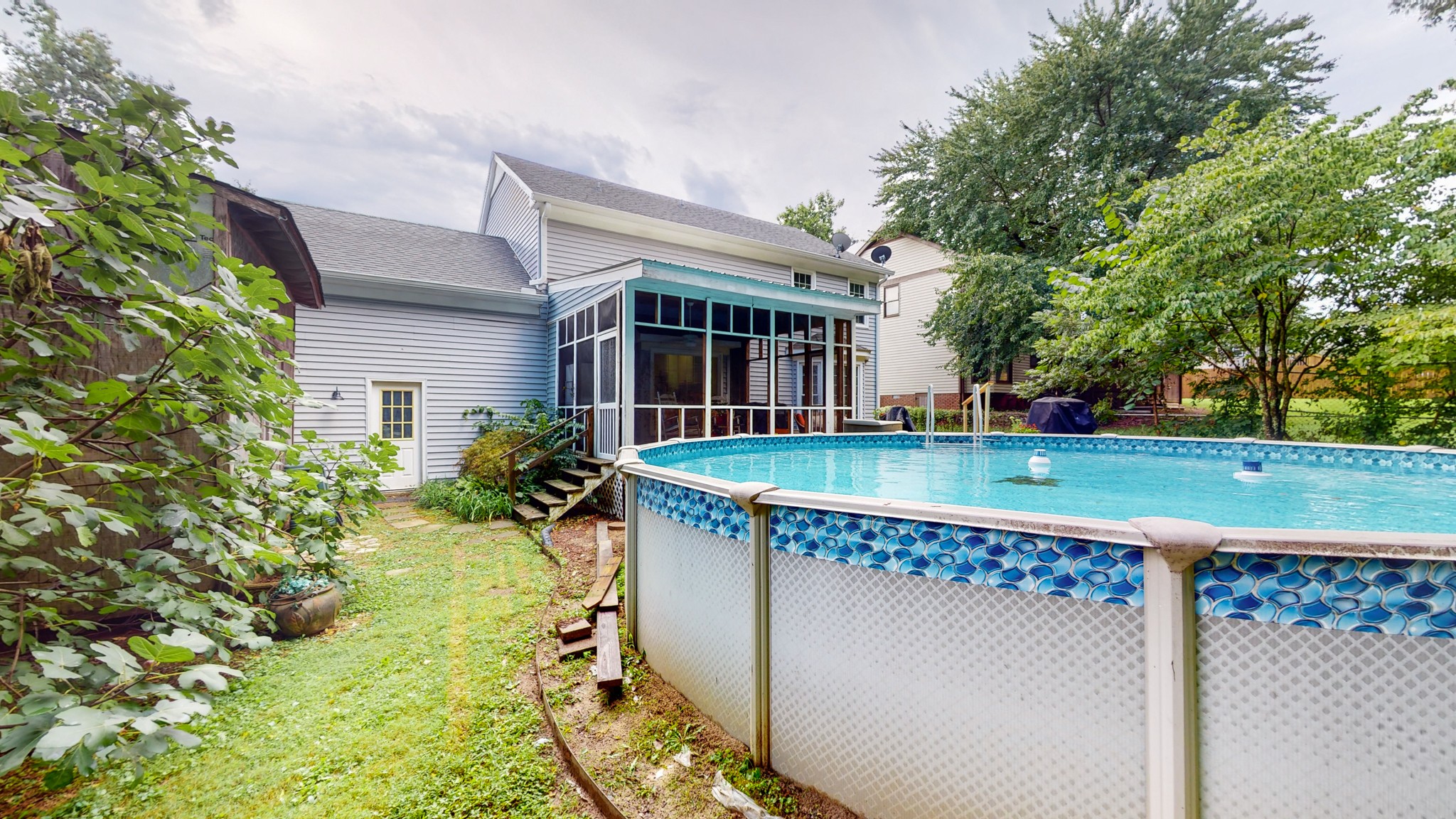 2019 Hidden Cove Road Mount Juliet, TN 37122 - Photo 2 of 29 a view of a house with a backyard