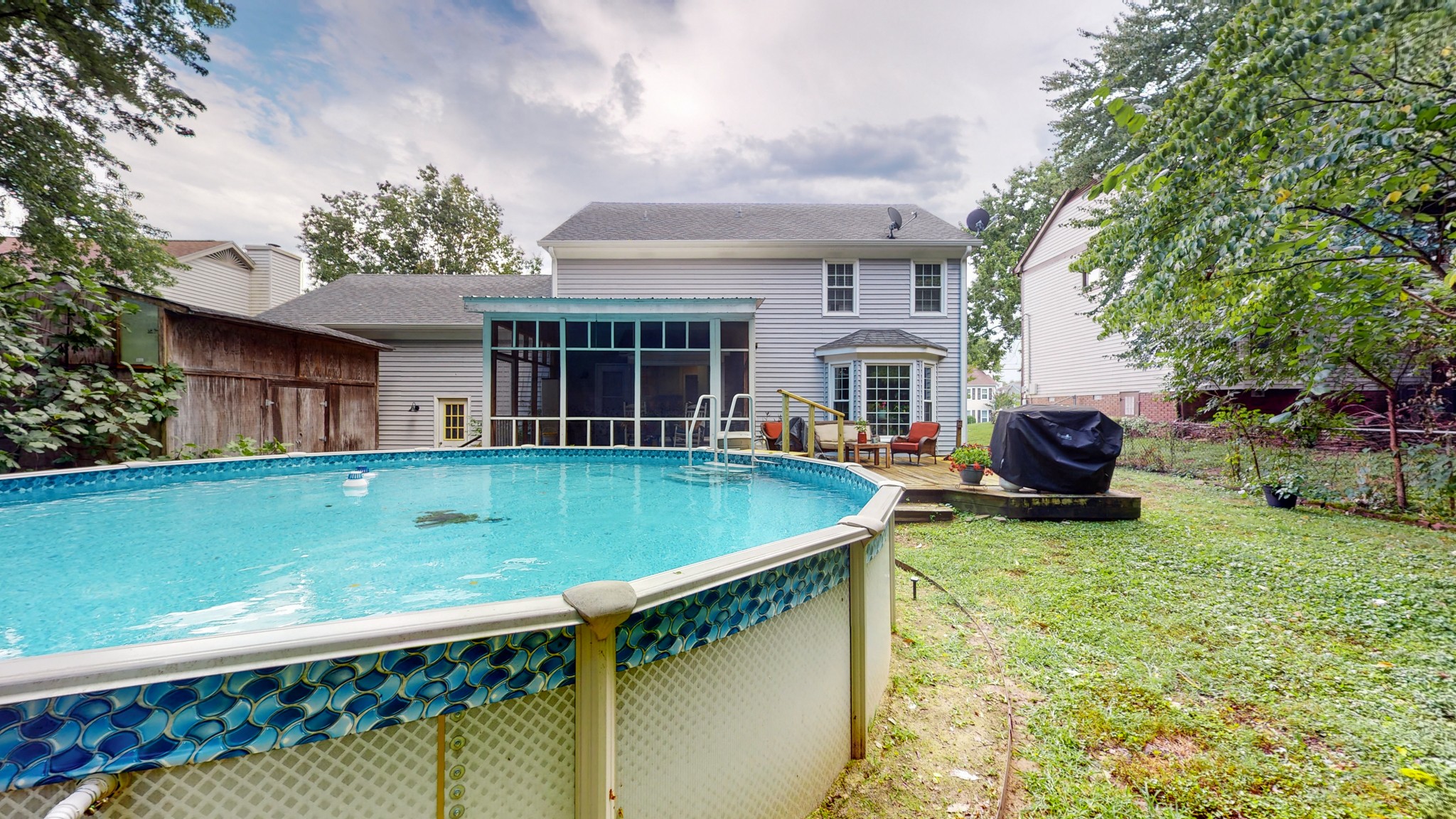 2019 Hidden Cove Road Mount Juliet, TN 37122 - Photo 21 of 29 a view of a house with pool and a yard
