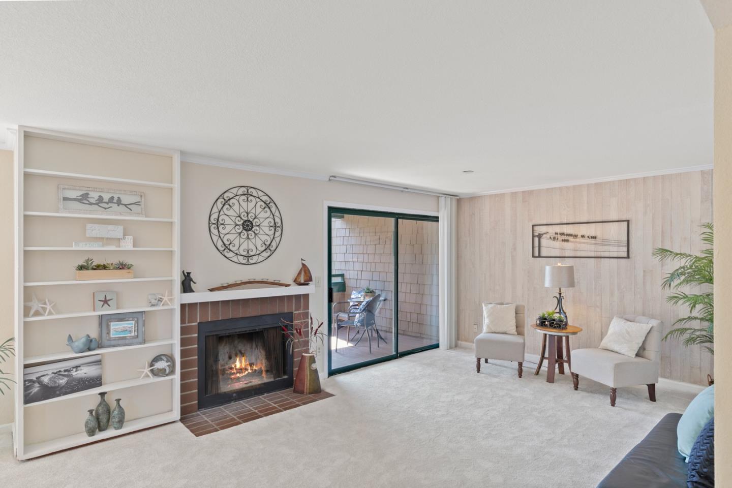321 Broadway, Unit C2 Santa Cruz, CA 95060 - Photo 1 of 46 a living room with furniture and a fireplace