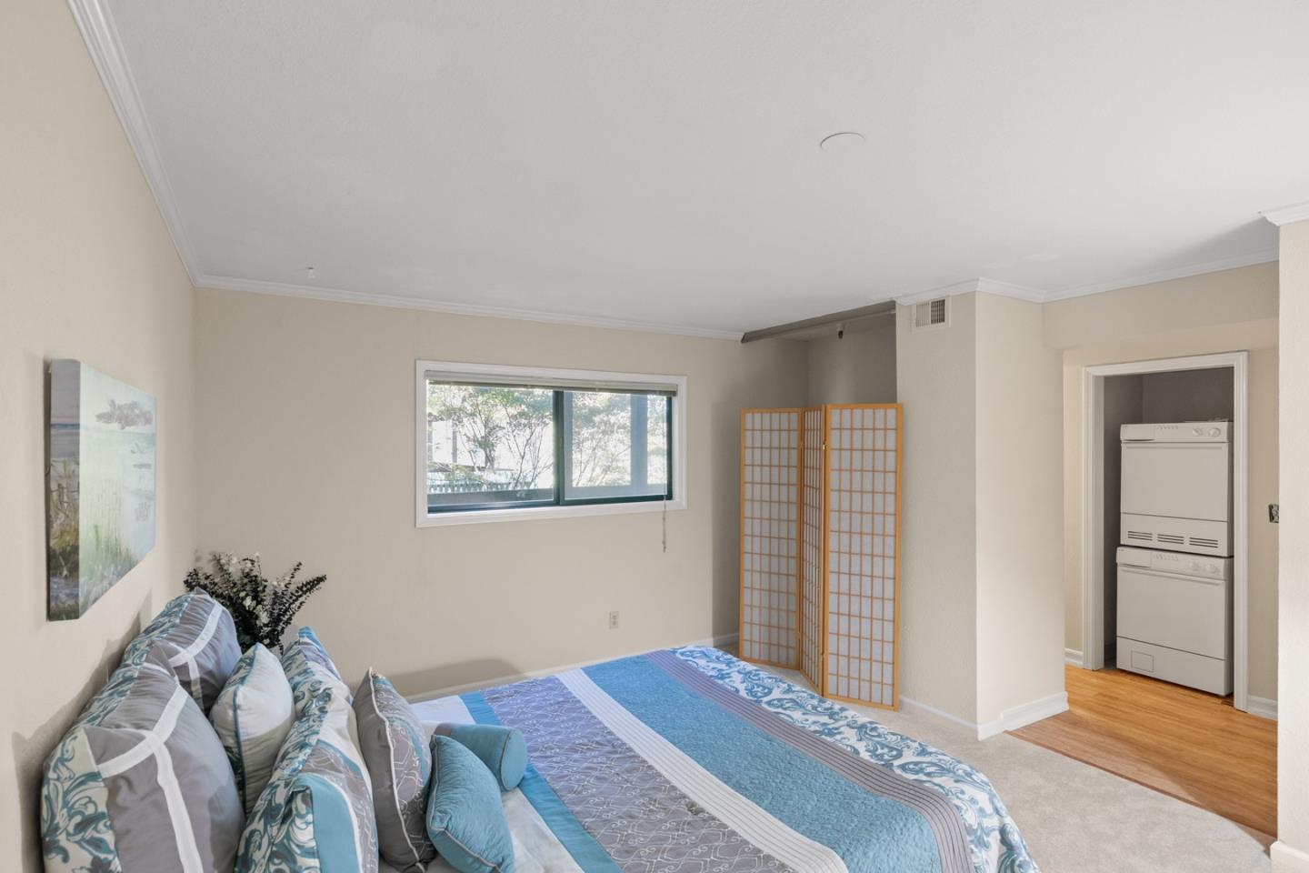 321 Broadway, Unit C2 Santa Cruz, CA 95060 - Photo 15 of 46 a bedroom with a bed and a window