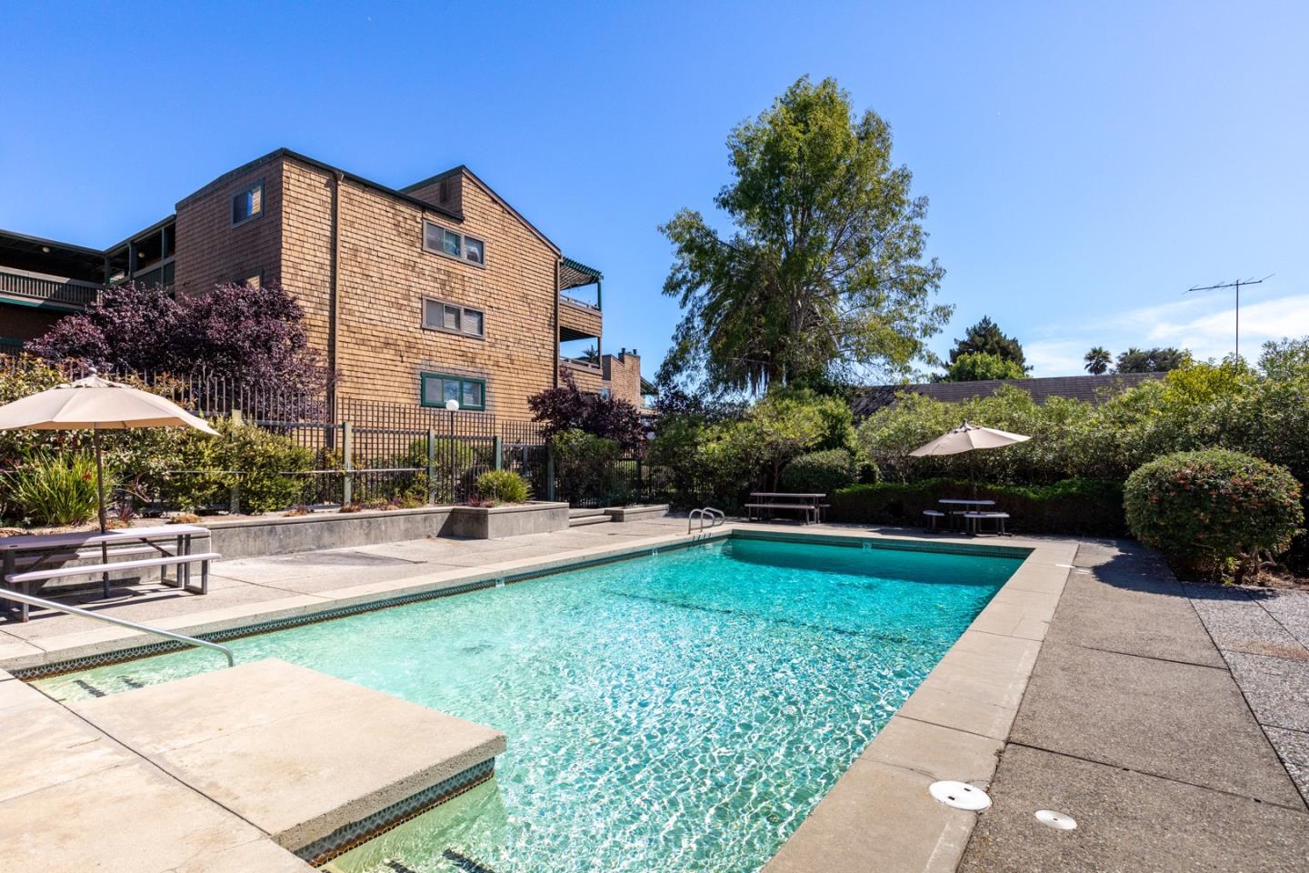 321 Broadway, Unit C2 Santa Cruz, CA 95060 - Photo 33 of 46 a view of a house with backyard and sitting area