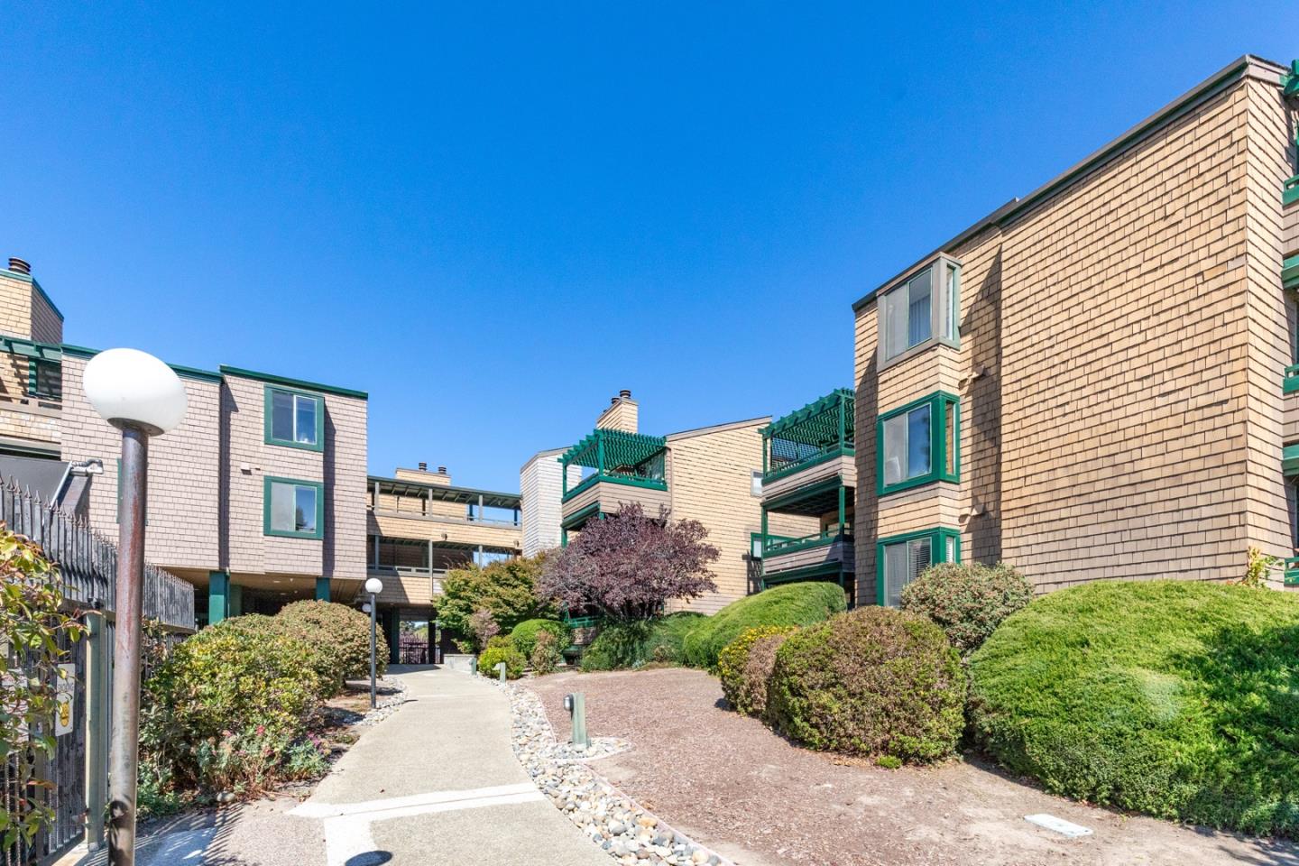 321 Broadway, Unit C2 Santa Cruz, CA 95060 - Photo 36 of 46 a front view of a building with garden