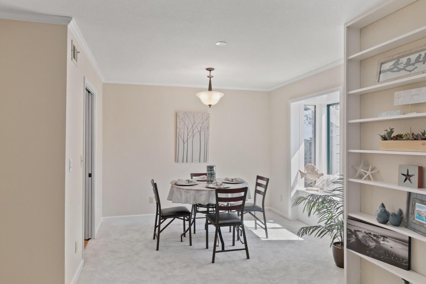 321 Broadway, Unit C2 Santa Cruz, CA 95060 - Photo 4 of 46 a view of a dining room with furniture