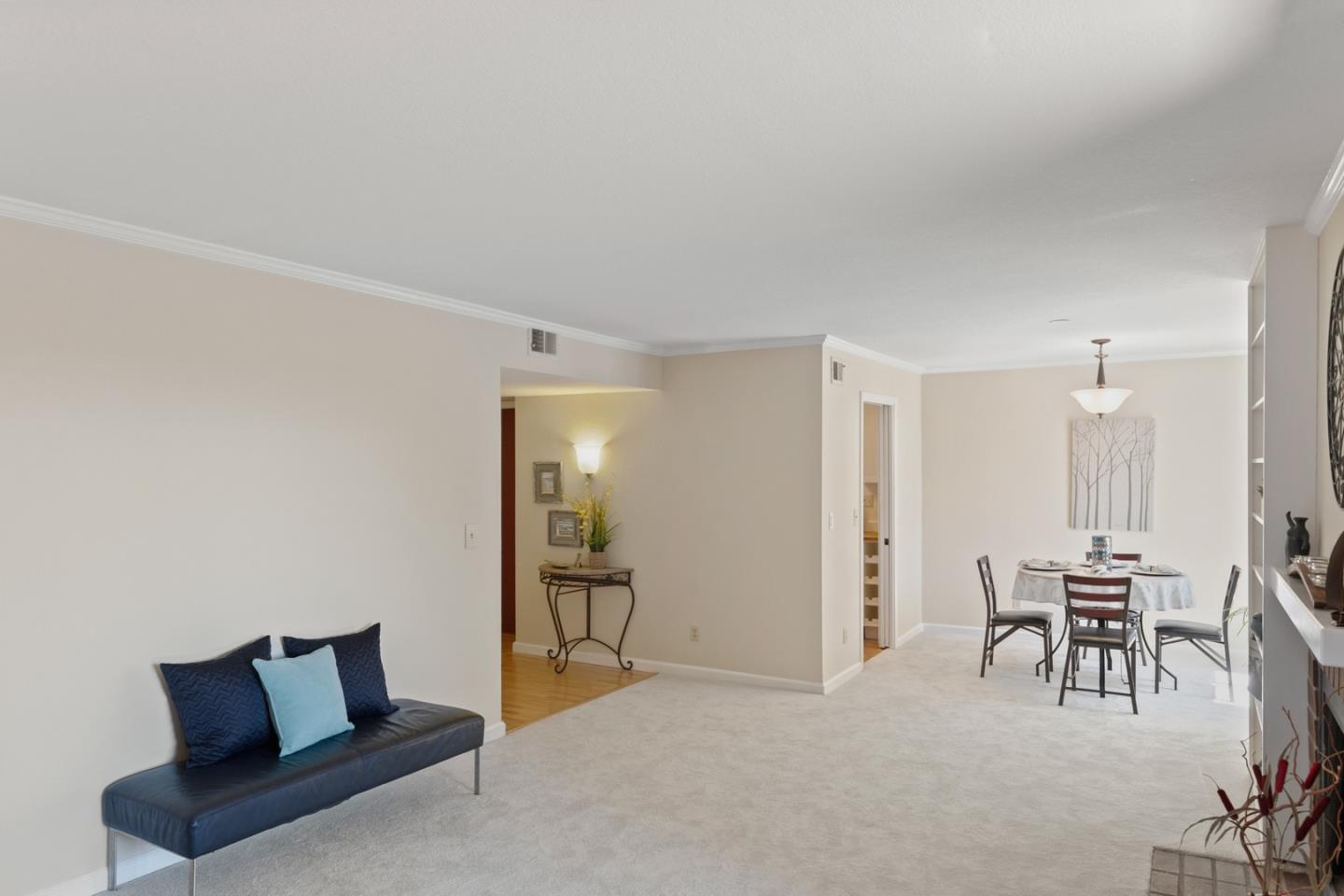 321 Broadway, Unit C2 Santa Cruz, CA 95060 - Photo 5 of 46 a bedroom with furniture and a potted plant