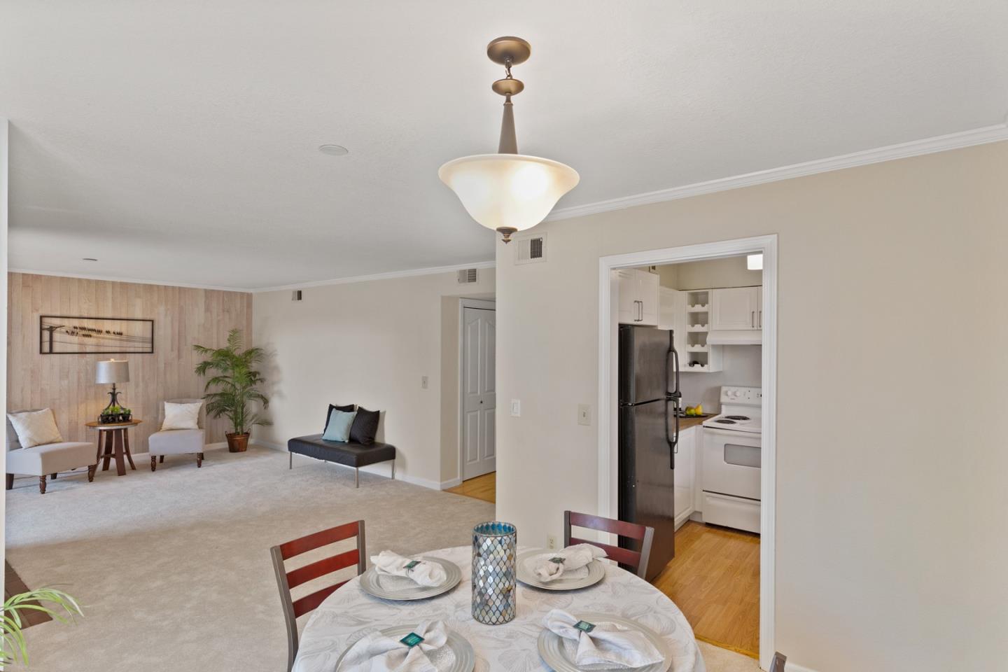 321 Broadway, Unit C2 Santa Cruz, CA 95060 - Photo 7 of 46 a living room with furniture and a table