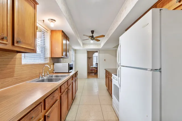 a bathroom with a sink a mirror and a bathtub