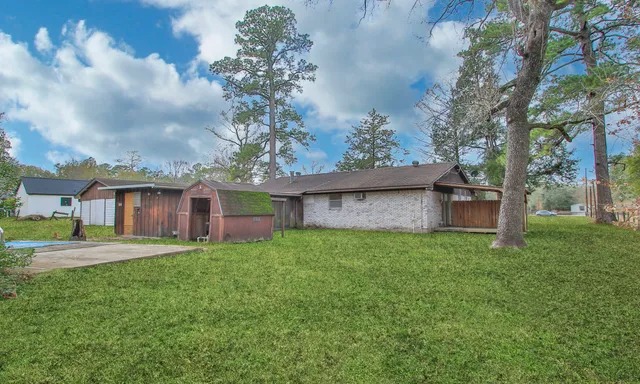 a house view with a garden space