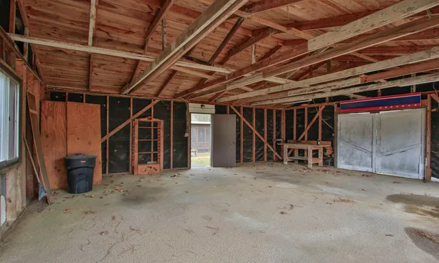 a view of an empty room with storage