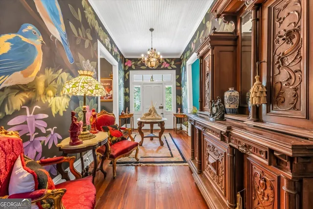 a living room with fireplace furniture and a flat screen tv