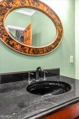 a kitchen with sink and window