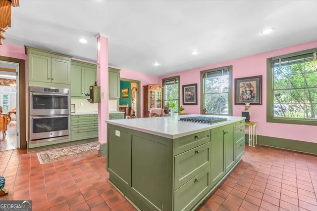 a bedroom with a bed and a fireplace