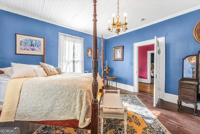 a view of entryway with wooden floor and a potted plant