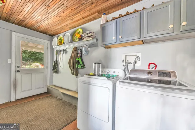a outdoor space with a patio and white fence