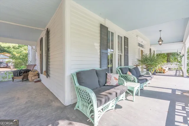 a view of a swimming pool with a yard