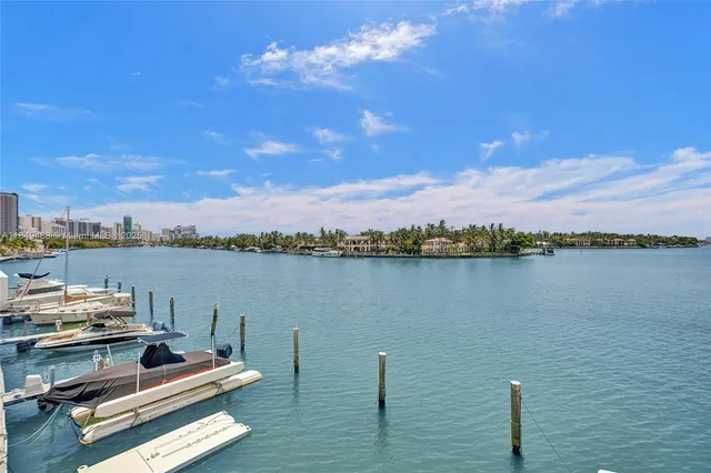 a view of a lobby with furniture and a chandelier