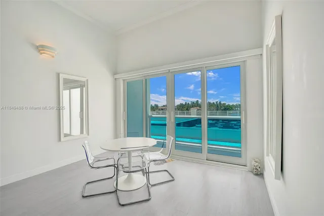 a view of a livingroom with furniture and window