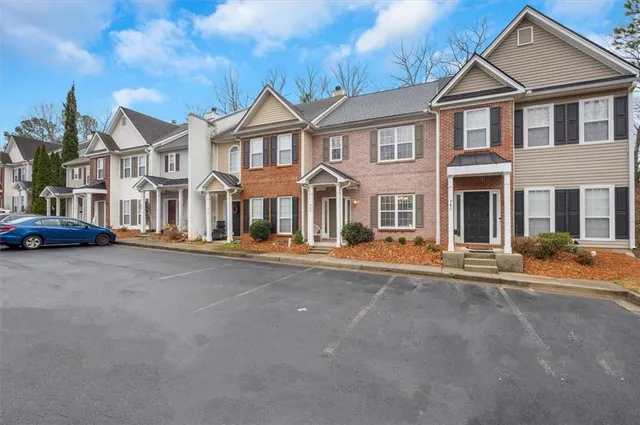 front view of a house with a lots of windows