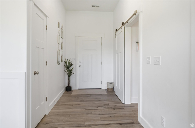 1422 West 3410th Street South Logan, UT 84321 - Photo 3 of 33 Entryway with wood-finish flooring